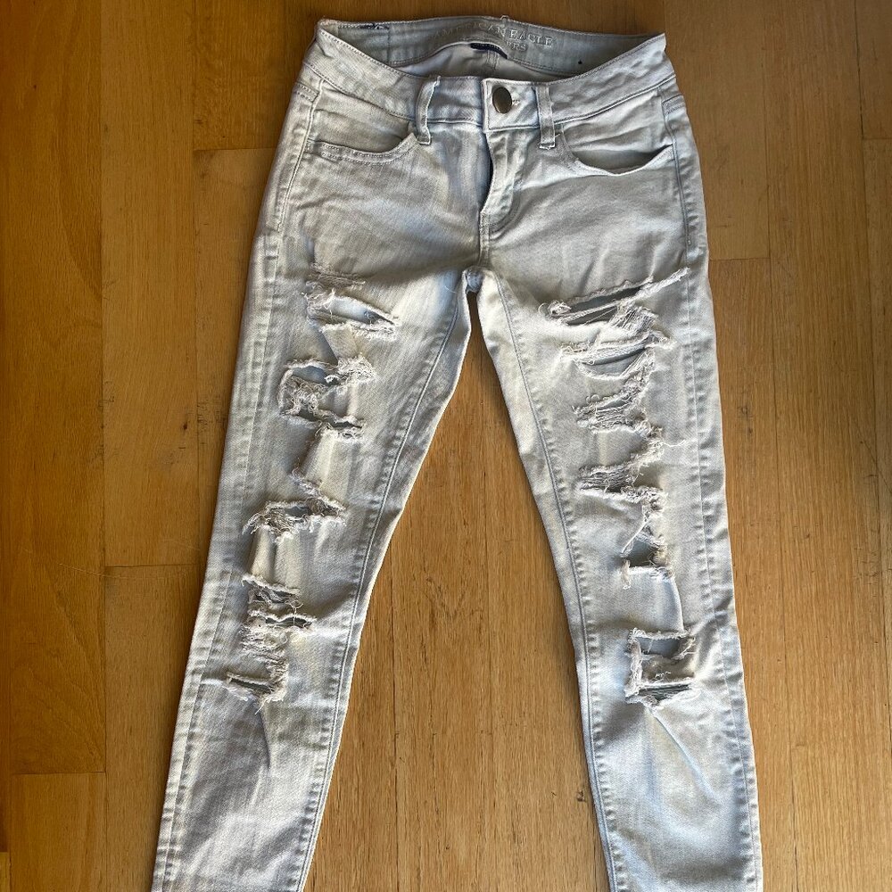 American Eagle Super Low Rise Distressed Light Blue Skinny Jeggings